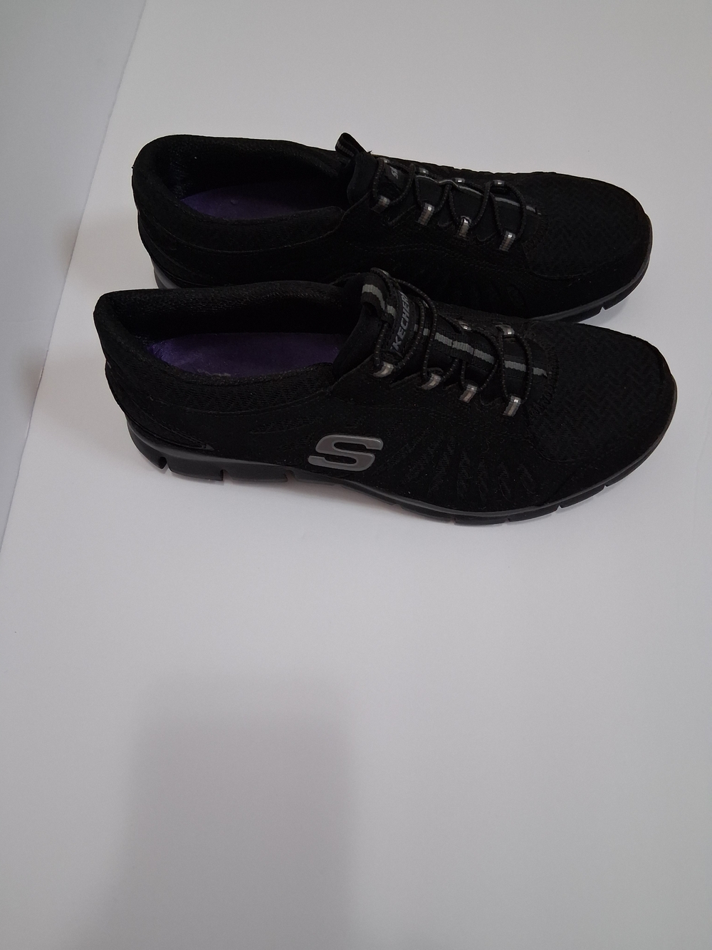 Womens Skechers Black Slip-On Sneakers with Purple Insole